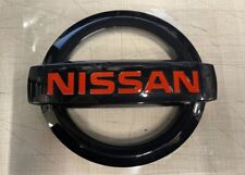 NISSAN EMBLEM GLOSS BLACK AND RED FITS FOR THE FRONT BUMBER FOR 350Z/370Z picture