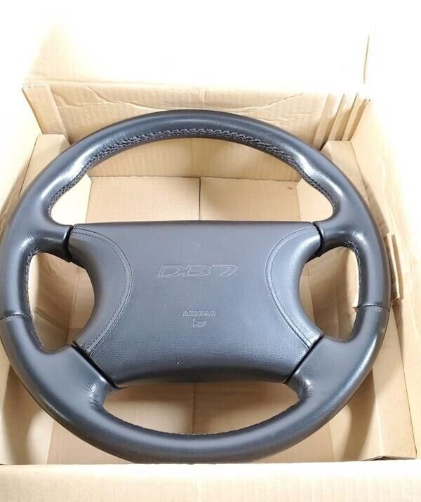 Aston Martin DB7 black leather steering wheel with center hub