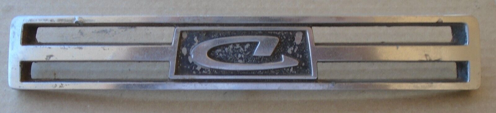 Vintage 1967-68-69-70 Datsun Roadster Grill Name Plate Ornament Badge