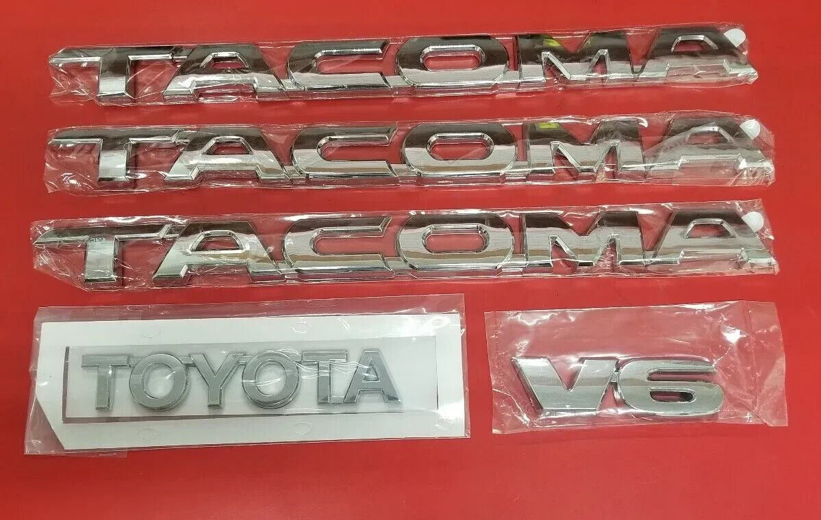 TOYOTA TACOMA EMBLEMS 5 PCS SET/  DOORS AND TAILGATE CHROME ABS DECALS NEW ,